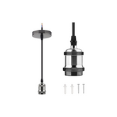 Pendant light fixture with clear glass shade and black metal components on a white background